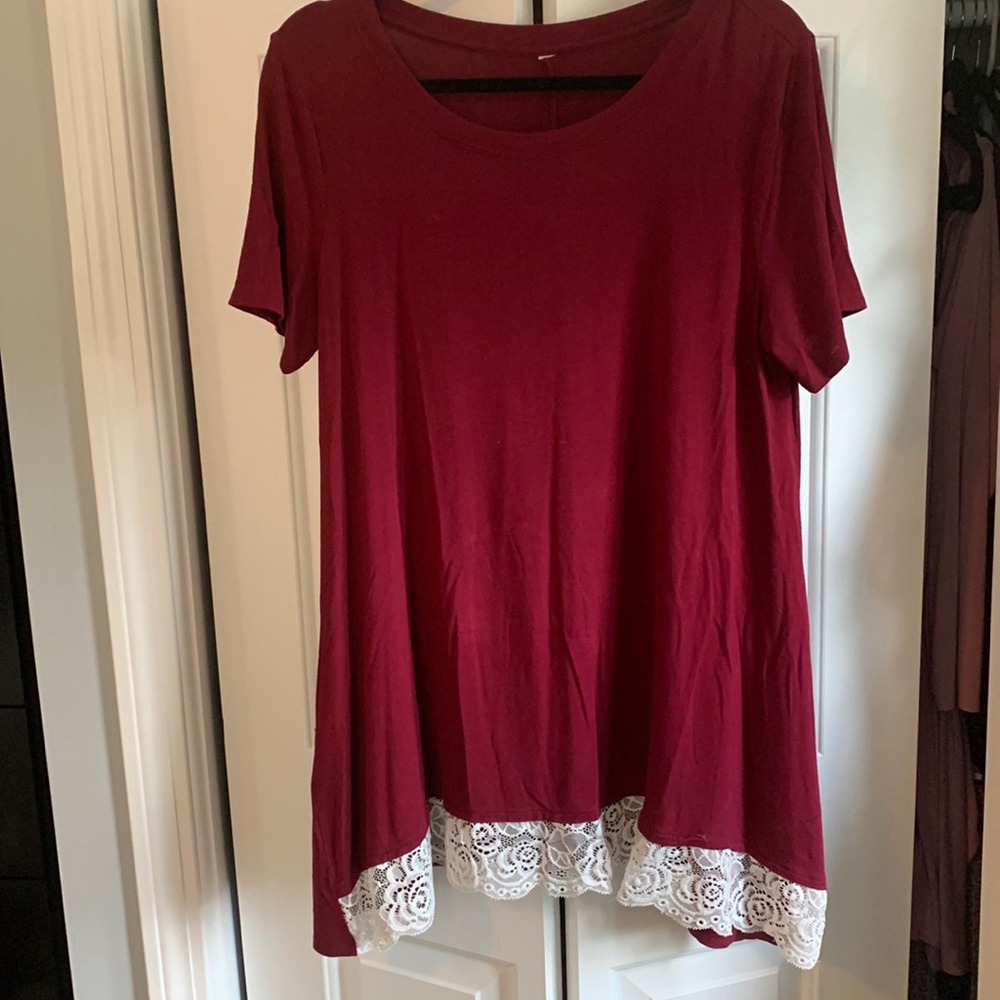 Burgundy red tunic with lace front bottom.